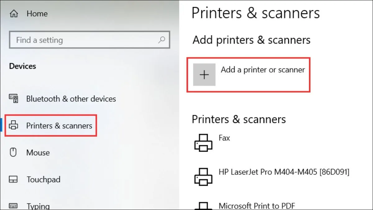 Chọn Printers & scanners, tiếp theo chọn Add a Printer or scanner. Lúc này, hệ thống sẽ quét và tìm kiếm máy in.